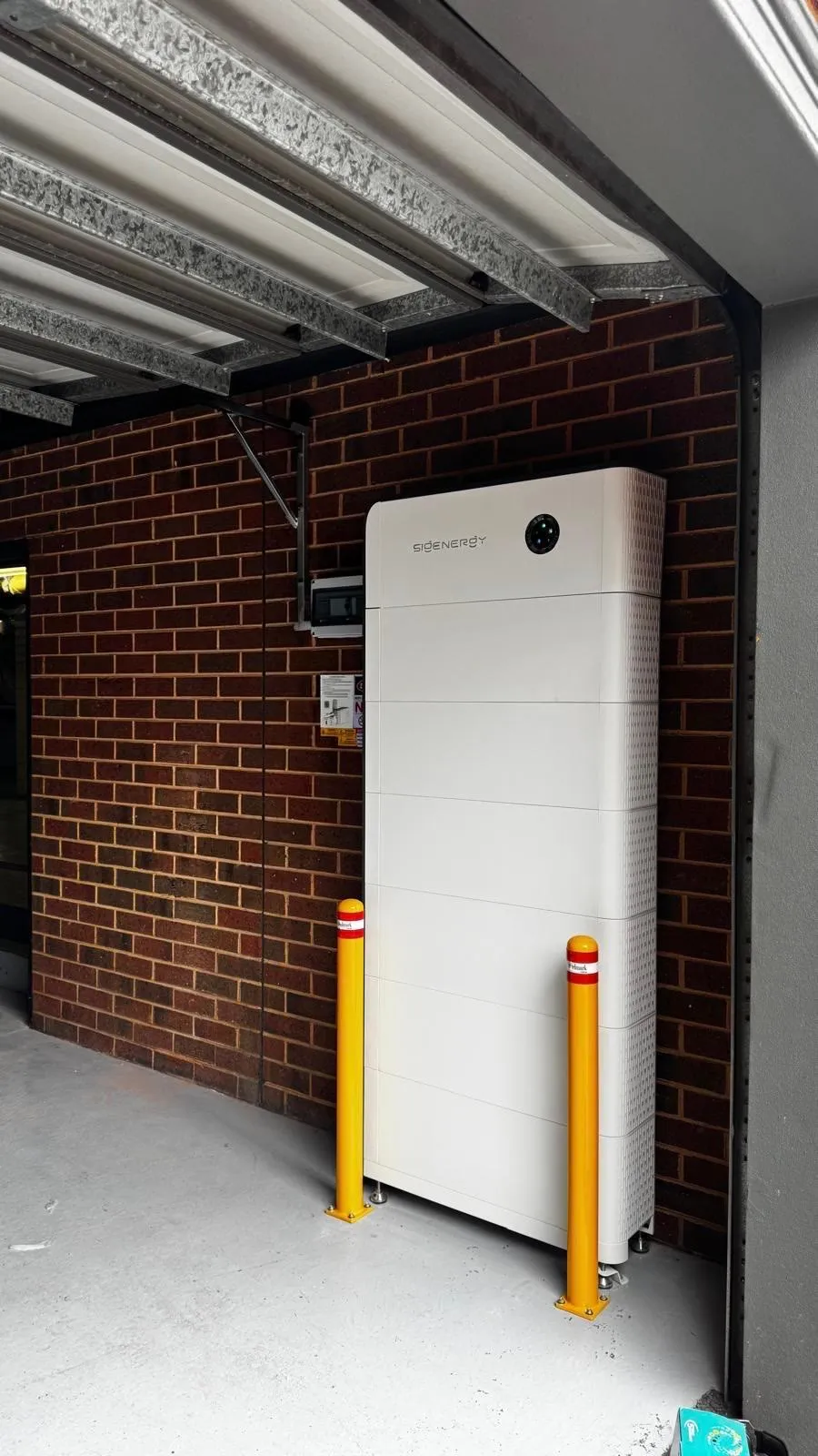 A Sigenergy SigenStor battery stack installed in a garage